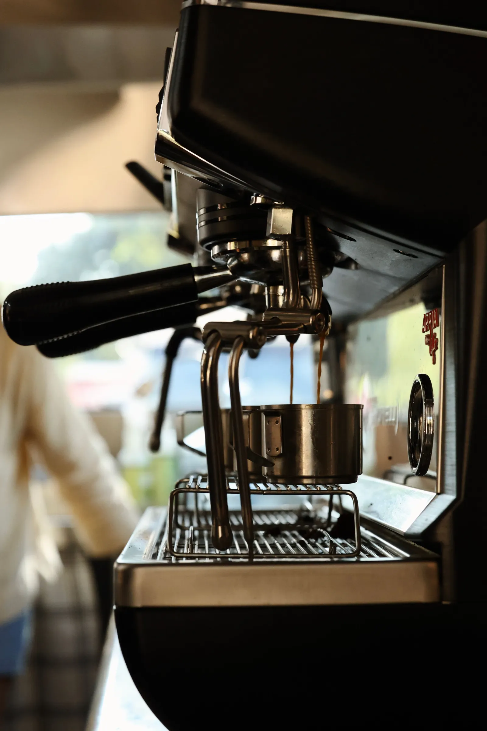 The espresso machine pulling a double shot on board the Encounter Coffee mobile espresso bar